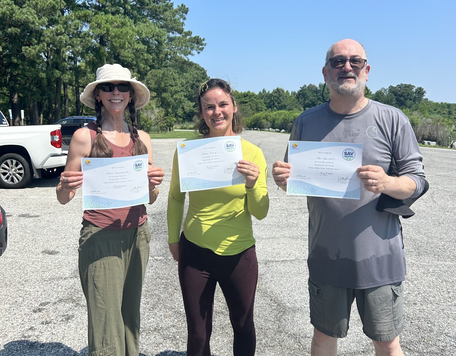 St. Mary's River Watershed Association's Elaine Szymkowiak, Emma Green Ewing, and John Spinicchia pose with their SAV Watchers Training Certificates on July 8, 2025. 